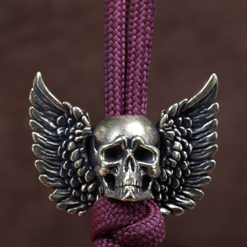 Winged Skull ทองเหลืองมีดลูกปั - Paracord Survival Bracelet บทวิจารณ์และราคา