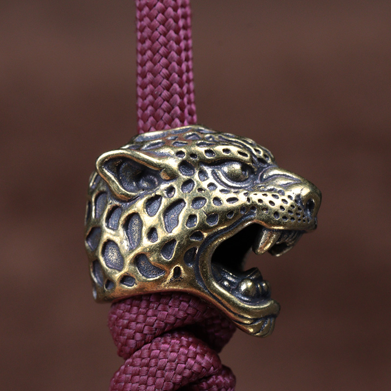 หัวเสือดาวประติมากรรมทองเหลือง - Paracord Survival Bracelet บทวิจารณ์และราคา