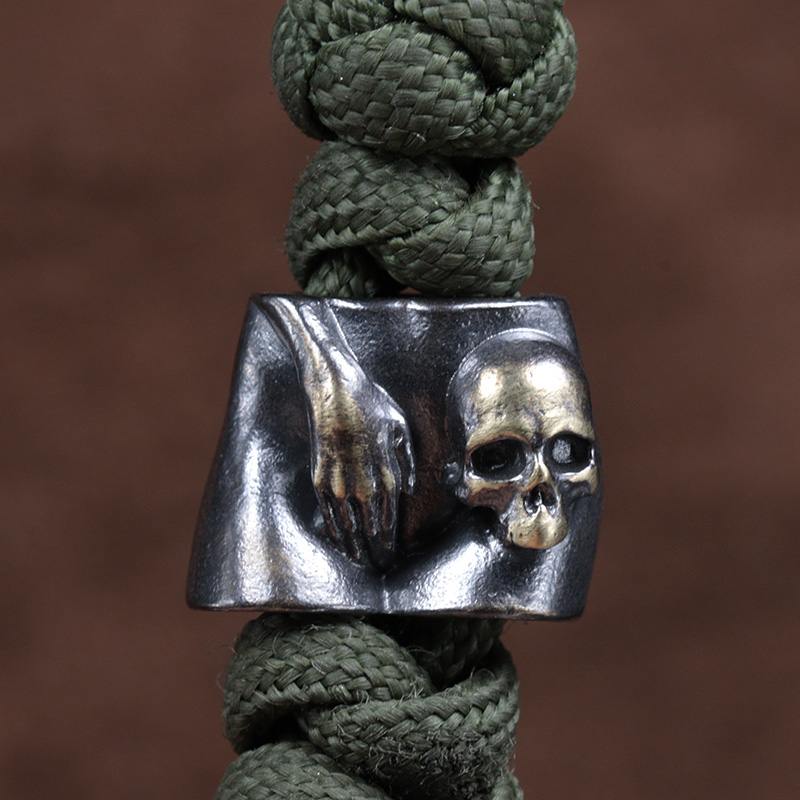ลูกปัดรูปหัวกะโหลกทองเหลือง สำ - Paracord Survival Bracelet บทวิจารณ์และราคา